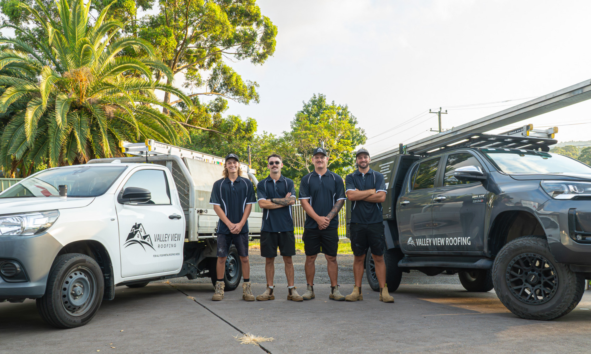 The Valley View Roofing crew and utes